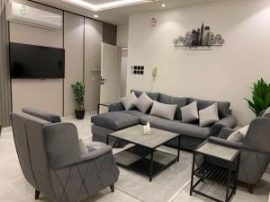 Posezení v ubytování Downtown Suites Orbitnet + 48 fotografií