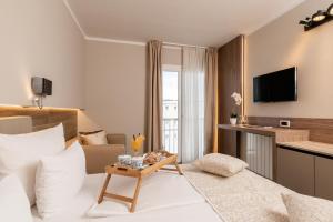 TV a/nebo společenská místnost v ubytování Hotel Malin