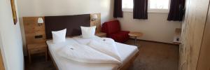 Voodi või voodid majutusasutuse Hotel Stülzis toas