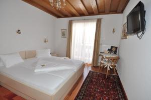 Voodi või voodid majutusasutuse Hotel Stülzis toas