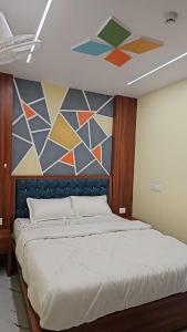 Postel nebo postele na pokoji v ubytování kangaroo hotel