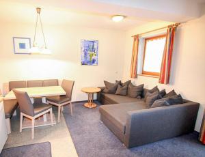 Posedenie v ubytovaní Ferienwohnung Königsleiten 2a - Top UG