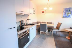 Kuchyňa alebo kuchynka v ubytovaní Ferienwohnung Königsleiten 2a - Top UG
