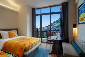 Afbeelding uit fotogalerij van Yinmo Hotel in Shahe +28 foto's