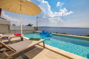 Bazén v ubytování Traumhafte Finca nur 480 Meter zum Strand mit Meerblick, Privatpool, Waschmaschine nebo v jeho okolí