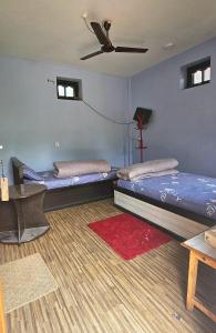 Postel nebo postele na pokoji v ubytování Batuwa Resort