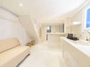 Kuchyň nebo kuchyňský kout v ubytování 2-bedroom LOFT apartment + 14 fotografií