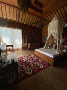 Giường trong phòng chung tại JOGLo D'bukit