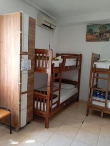 Postel nebo postele na pokoji v ubytování Rose Hostel