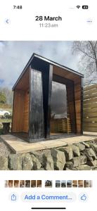 a rendering of a small building with a window at Airds Farm Guest House in Castle Douglas
