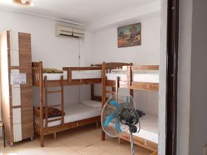 Postel nebo postele na pokoji v ubytování Rose Hostel