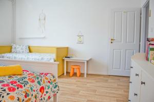 Postel nebo postele na pokoji v ubytování Dvě deci - Mikulov