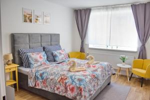 Postel nebo postele na pokoji v ubytování Dvě deci - Mikulov