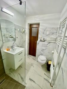 Koupelna v ubytování Casa Bocskai-Vendégház