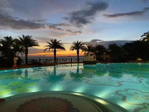 Bazén v ubytování Continental Xin Hao Hotel and Resort 洲际新濠酒店 nebo v jeho okolí