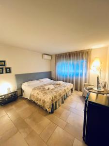 Postel nebo postele na pokoji v ubytování Welcome Traveller Leda Rooms