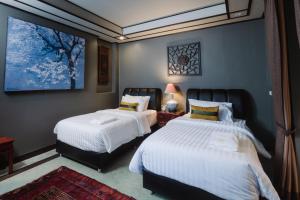 Ένα ή περισσότερα κρεβάτια σε δωμάτιο στο X Lunar Mansion Hotel - โรงแรม ลูน่า แมนชั่น เชียงใหม่ +96 φωτογραφίες