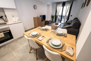 Η κουζίνα ή μικρή κουζίνα στο Apartamentos Alegre