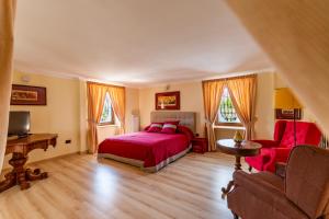 Letto o letti in una camera di Villa Vesuvio