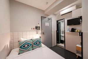 MK STAY - formerly HOTEL MK 객실 침대