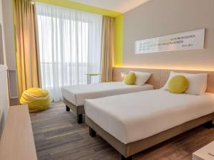 Voodi või voodid majutusasutuse ibis Styles Chisinau toas