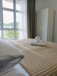 Postel nebo postele na pokoji v ubytování Mslim Friendly Stay at Bayu Aisyah Putrajaya, Presint 11 + 19 fotografií