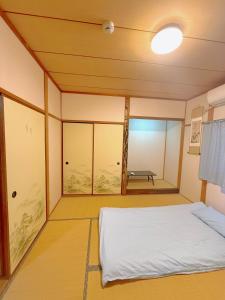 Fotografie z fotogalerie ubytování 余欢 一栋三层楼的一户建 v destinaci Nishi-shibuta