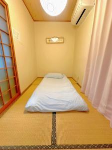 Fotografie z fotogalerie ubytování 余欢 一栋三层楼的一户建 v destinaci Nishi-shibuta