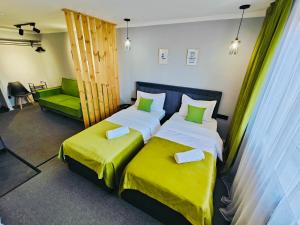 Ένα ή περισσότερα κρεβάτια σε δωμάτιο στο The Apartments 95 Идеально для туризма и деловых командировок