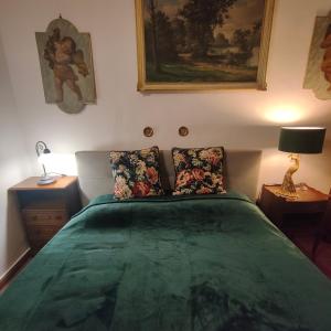 A bed or beds in a room at Suite Dimora Lucrezia