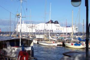 a group of boats docked in a marina at Warnemünde Fischer`s Hus 10139 in Rostock +10 photos