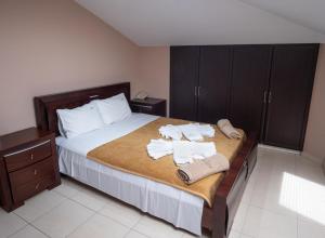 Ένα ή περισσότερα κρεβάτια σε δωμάτιο στο Hotel Dionysos Polichrono