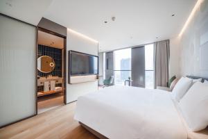 EVEN Hotel 上海金桥逸衡酒店客房内的一张或多张床位