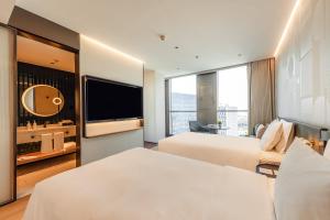 EVEN Hotel 上海金桥逸衡酒店客房内的一张或多张床位