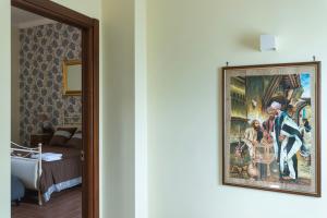 Letto o letti in una camera di Villa Vesuvio