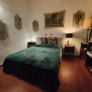 A bed or beds in a room at Suite Dimora Lucrezia