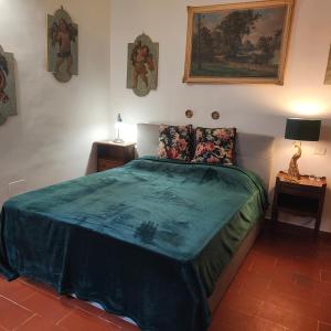 A bed or beds in a room at Suite Dimora Lucrezia