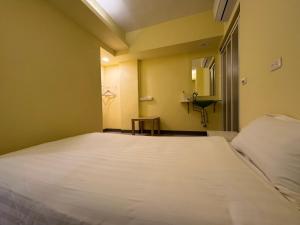 Postel nebo postele na pokoji v ubytování 慢且洄瀾文旅 Bantshiann Hualie Hotel