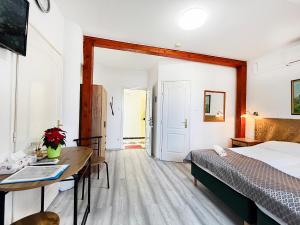 Voodi või voodid majutusasutuse Hotel Balaton Fonyód toas