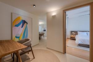 Ένα ή περισσότερα κρεβάτια σε δωμάτιο στο Ilva Suites +40 φωτογραφίες