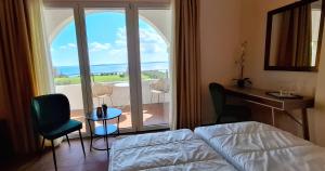 Postel nebo postele na pokoji v ubytování La Kascina Suite & Rooms