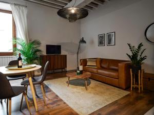 A television and/or entertainment centre at On the Duomo - Super Chic
