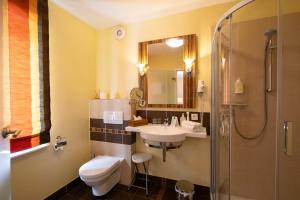 Kylpyhuone majoituspaikassa Hotel Sonnenhof