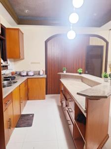 Kuchyň nebo kuchyňský kout v ubytování N6 Transient House Apartment Room near Abreeza Mall SPMC USEP SM Lanang + 5 fotografií