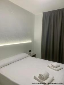 Postel nebo postele na pokoji v ubytování Hotel DL Urban