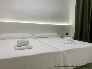 Postel nebo postele na pokoji v ubytování Hotel DL Urban