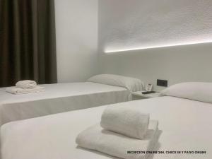 Postel nebo postele na pokoji v ubytování Hotel DL Urban