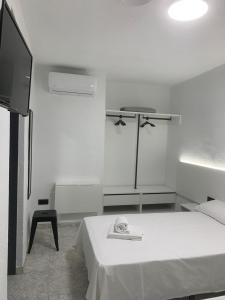 Postel nebo postele na pokoji v ubytování Hotel DL Urban