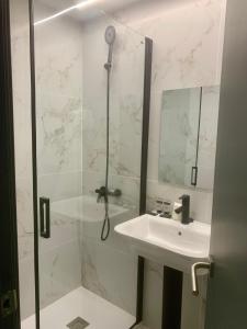 Koupelna v ubytování Hotel DL Urban