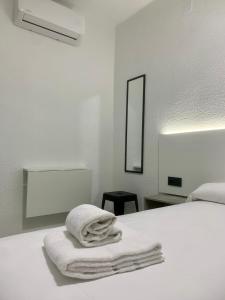 Postel nebo postele na pokoji v ubytování Hotel DL Urban